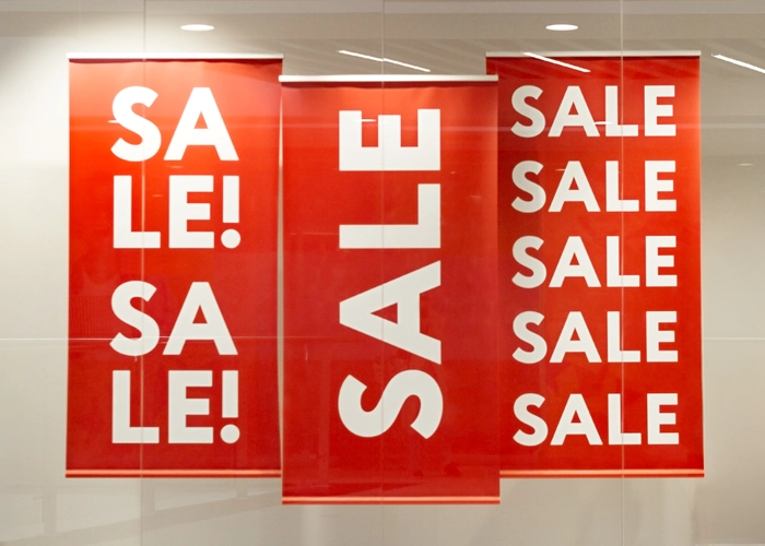 Banners promoting a holiday sale
